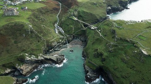 Aerial View Of The Ruined Tintagel Castle On The Peninsula Of Tintagel Island, Cornwall, UK - drone shot