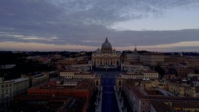 aerial drone view, San Pietro Basilica, shot with drone along Via della Conciliazione  - Vatican City