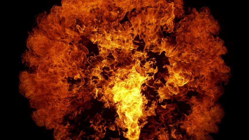 Super Slow Motion Shot of Round Fire Explosion Against the Black Wall at 1000fps.
