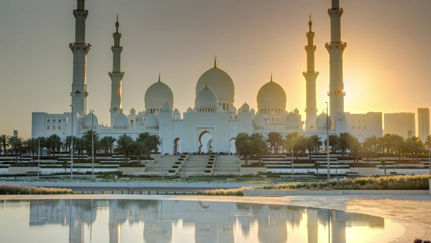 Sheikh Zayed Grand Mosque in Abu Dhabi at sunset timelapse, UAE. Evening view from Wahat Al Karama Royalty-Free Stock Footage #1063533355