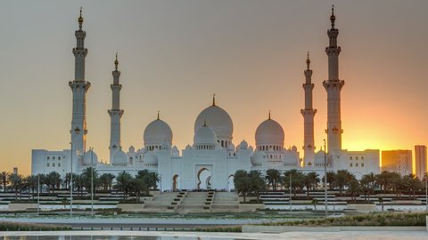 Sheikh Zayed Grand Mosque in Abu Dhabi at sunset timelapse, UAE. Evening view from Wahat Al Karama