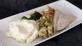 Pouring Gravy over a Turkey Dinner - Powered by Shutterstock - Get 15% off with code: PIKWIZARD15