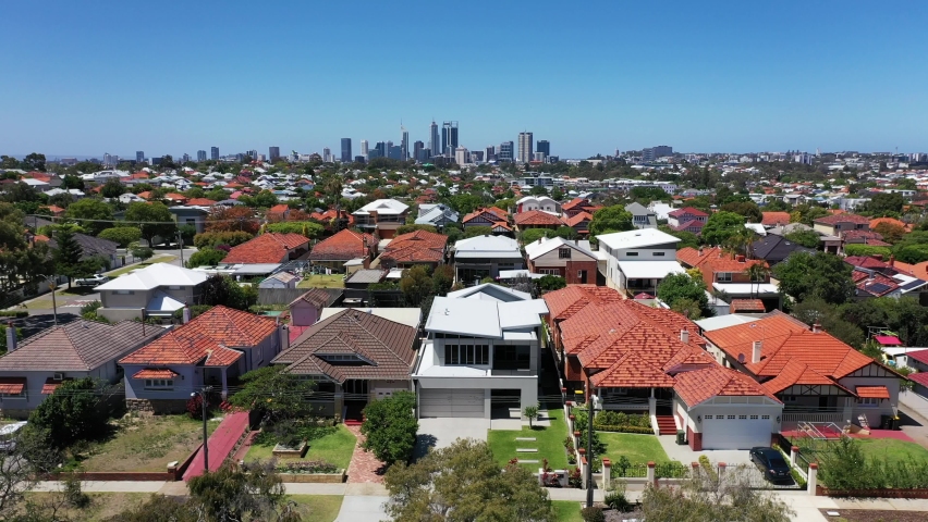 Aerial view of urban suburban cityscape with clear blue sky of Perth, Western Australia. No people. Copy space Royalty-Free Stock Footage #1063545505