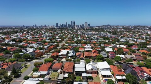 Aerial view of urban suburban cityscape with clear blue sky of Perth, Western Australia. No people. Copy space