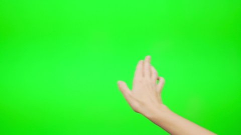 A Girl Flips Slides Touches Her Hand on a Large Green Touch Screen, Green Background, Touch Digital Device, Touch Computer, Laptop. Close-up of a Woman's Hands and a Green Touch Screen.