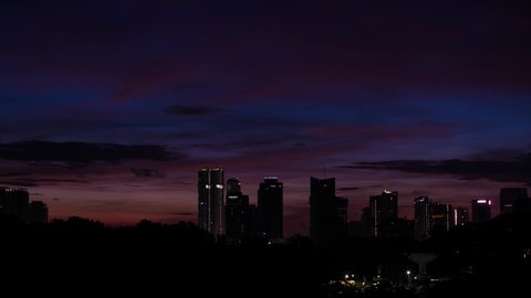 Johor Bahru , Johor , Malaysia - 04 29 2020: Beautiful sunrise time lapse of Johor Bahru cityscape, Malaysia 