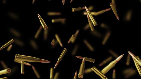 Falling bullets on a black background with depth of field. 4k loop animation