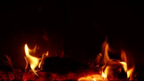 
Detail of calm burning flames in fireplace in Slow Motion HD VIDEO. Natural fire filling full frame of screen. Quarter speed. Close-up.