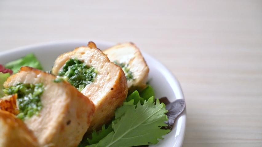 Baked chicken breast stuffed with cheese and spinach Royalty-Free Stock Footage #1063609648