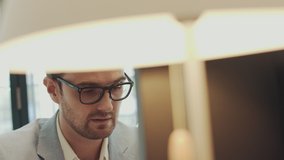 Thoughtful serious young african american man student writer sit at home office desk with laptop thinking of inspiration search problem solution ideas lost in thoughts concept dreaming looking away. - Powered by Shutterstock - Get 15% off with code: PIKWIZARD15