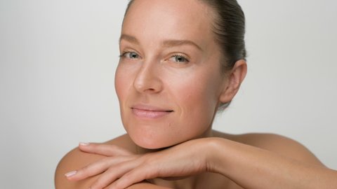Close-up beauty portrait of young woman with smooth healthy skin