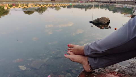 An Indian Women Relaxing Her Feet At The Bank Of Godavari River- 4K