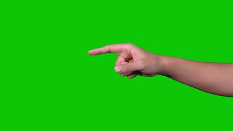 Pointing hand. Green background for chroma key composition.