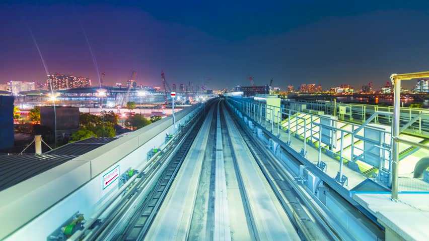 Point of view time-lapse through Tokyo via the automated guideway transit system (AGT) called the Yurikamome. Full ride at night. Shot in 5.7K and downscaled to 4K for extra sharp resolution. | Shutterstock HD Video #10636394