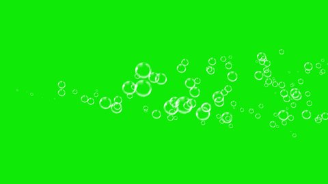 Soap Air Bubbles fly from left to right on a green background. Closeup different soap bubbles. Motion many water bubbles floating and falling out of screen. Seamless animation. Alpha channel. 4K