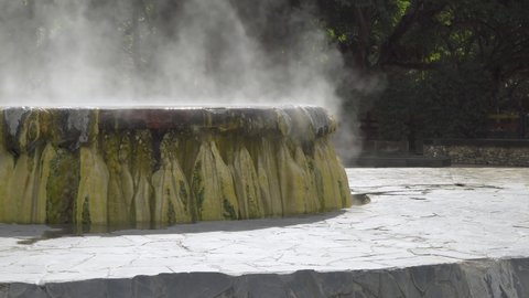 Famous natural hot spring well in Raksa Warin public park, Ranong, Thailand.