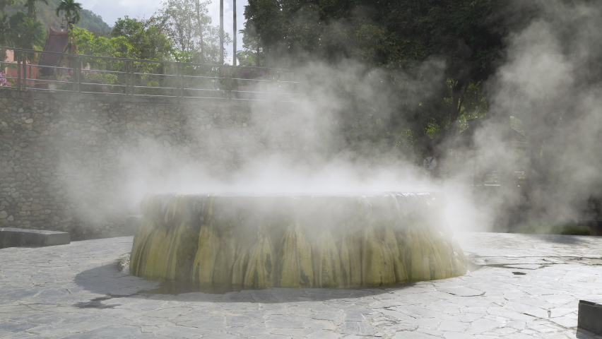 Famous natural hot spring well in Raksa Warin public park, Ranong, Thailand.