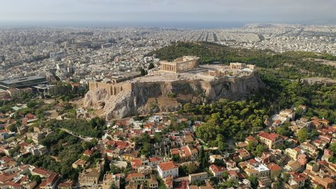Athens, Greece: Aerial view of temple Parthenon on Acropolis in ancient city center - landscape panorama of Europe from above
