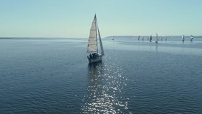 Aerial drone footage of regatta or sailing race at Dnipro river