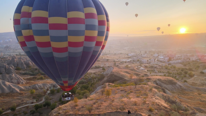 Cappadocia, Turkey : Balloons in the sky. Aerial view Royalty-Free Stock Footage #1063663351