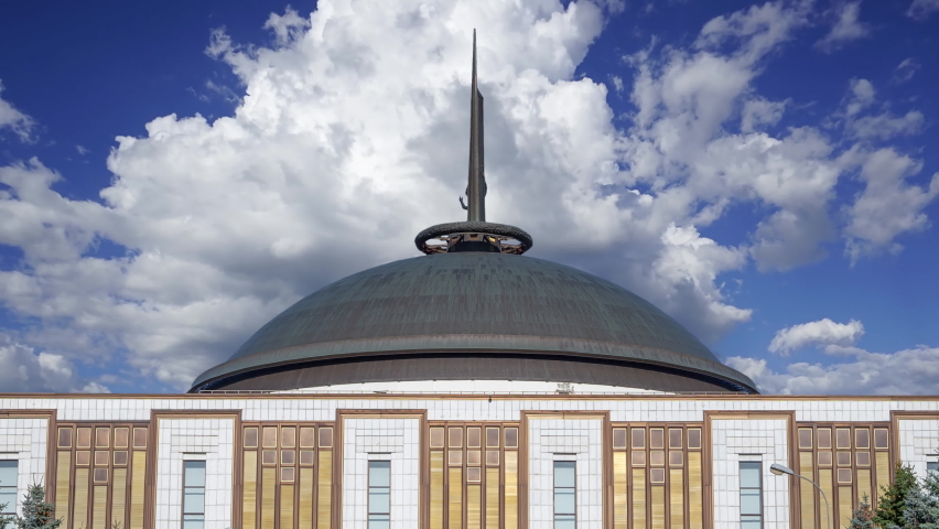 War memorial in Victory Park on Poklonnaya Hill (against the moving clouds), Moscow, Russia. The memorial complex constructed in memory of those who died during the Great Patriotic war 