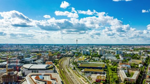 Aerial view of Berlin skyline with famous TV tower at Alexanderplatz and dramatic cloudscape , Germany