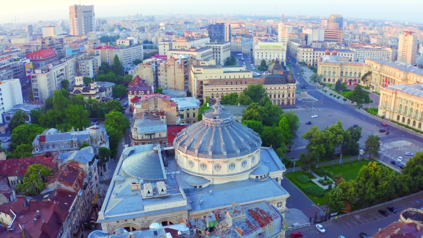 Bucharest, Romania, June, 6th, 2019. Aerial view of Romanian Atheneum. Aerial view of the Atheneum a landmark concert hall in the center of Bucharest the Romanian Capital. Royalty-Free Stock Footage #1063679008