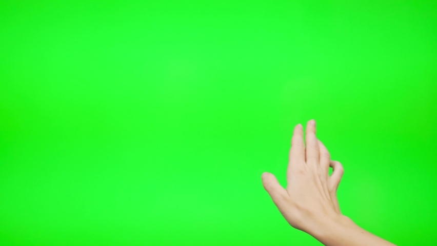 A Woman's Hand Flips Pages on the Internet from Right to Left on the Large Green Touch Screen of a Digital Device, a Touch-Sensitive Laptop. Close-up of Hands Flipping through a Green Background. Royalty-Free Stock Footage #1063694608