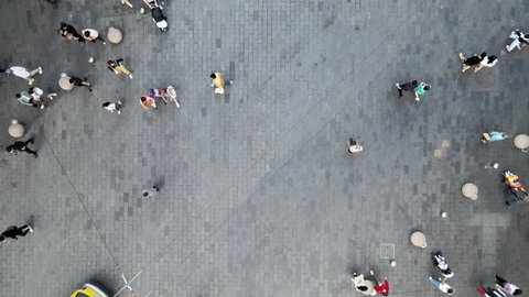 Aerial view of pedestrians in downtown in famous Shanghai China Nanjing road. Business economy, travel or industrial concept b-roll footage, drone aerial view in Shanghai China