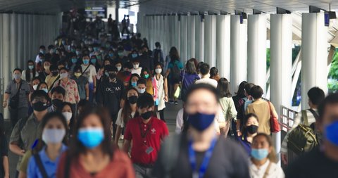 September 25, 2020. Bangkok, Thailand. Crowded Asian People Wearing Protective Mask For Protect Coronavirus, Covid 19 Virus During Virus Outbreak In Bangkok Thailand. Slow Motion Shot