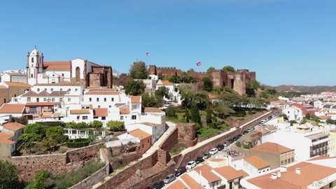 Scenic aerial view of fortified and walled city and Castle of Silves, Algarve, Portugal