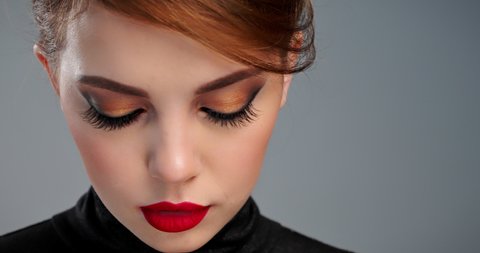 Beautiful woman with bright professional makeup. 