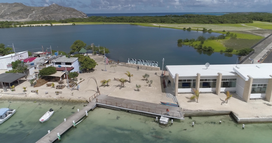 Gran Roques los roques venezuela righ to left tracking aerial view Beach and Fishermen Boats.