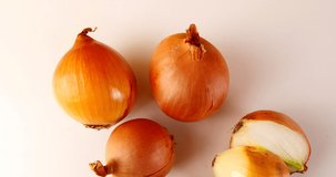 onion vegetable on a white background close-up beautiful video 4k
