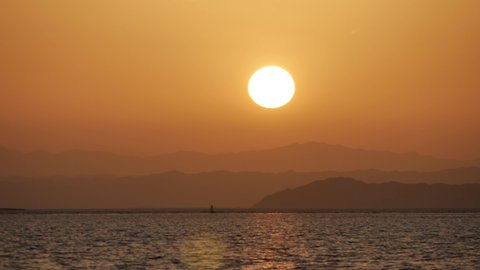 Timelaps: Sunset and mountains on the shores of the Red Sea, Egypt
