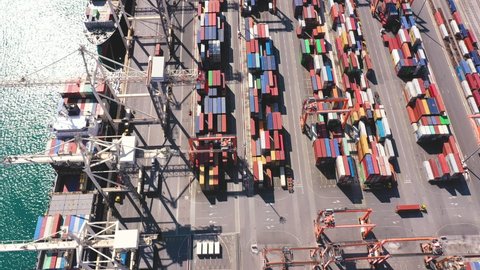 Aerial - Flying above the port. Logistics, transportation and shipment shot from above