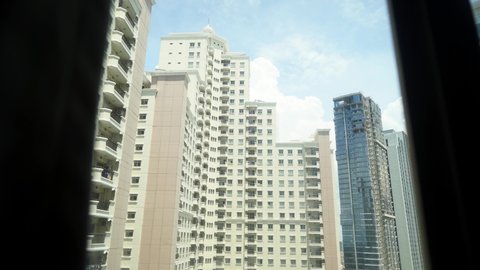 Surabaya, Indonesia December 9, 2020 :  Modern apartment buildings. Contemporary residential building exterior