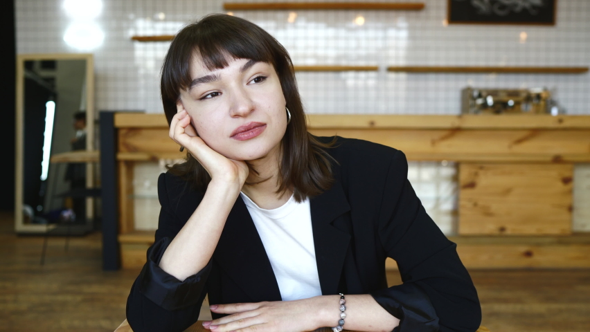 Young female candidate interviewed by employer. Portrait