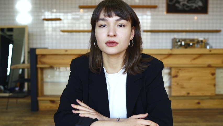 Young female candidate interviewed by employer. Portrait