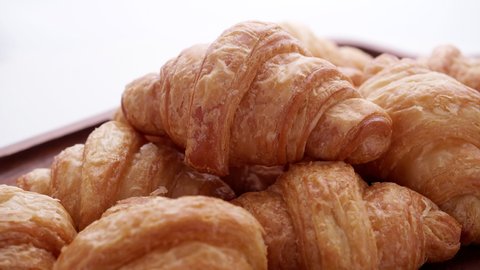 French crispy croissants rotate in slow motion