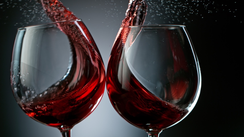 Super Slow Motion Shot of Clinking Two Glasses of Red Wine at 1000fps. | Shutterstock HD Video #1063826587