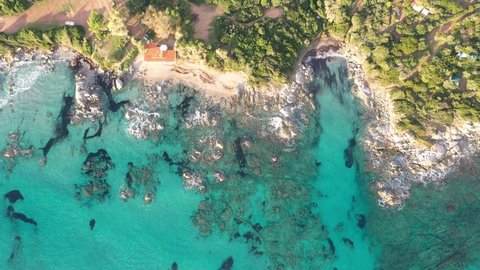 Aerial of the beautiful secluded Spiaggia il Golfetto Beach, Sardinia, Italy