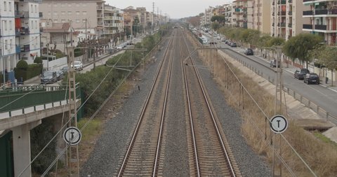 Cunit, Tarragona, Spain, December 2020 A suburban train passing through the town.