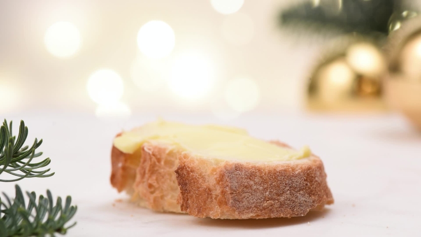 White bread with butter and red caviar. Traditional russian Christmas and New Year appetizer | Shutterstock HD Video #1063838038