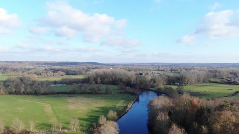 beautiful french countryside: Scenic aerial view of the Loire Region and green fields in French countryside: western France. Drone shot flying over tree tops, Nature background