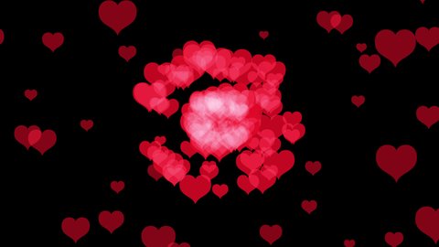 Animation of heart explosion. Bursts shiny hearts flying on a black background. Big hearts exploding into a lot of smaller hearts. Template for Valentine's Day or other celebration. 4K, Alpha channel.