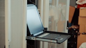 Maintenance Call Center Network Equipment.Website Development Or Hosting Server Room.Diagnostics Computer Hardware Console.IT Engineer Resolving Problem In the Server Room.Cloud Server Startup Company - Powered by Shutterstock - Get 15% off with code: PIKWIZARD15