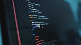 Close up of computer monitor screen with blue programming code, hacker background, software development, cyber security, coding technologies and digital innovation concept - Powered by Shutterstock - Get 15% off with code: PIKWIZARD15