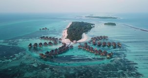 Aerial view of water bungalows, Huraa Island, Maldives. High quality 4k footage