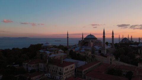 Hagia Irene, Hagia Sophia Near Sultan Ahmed Mosque At Sunset With Bosphorus In Background In Istanbul, Turkey. - aerial